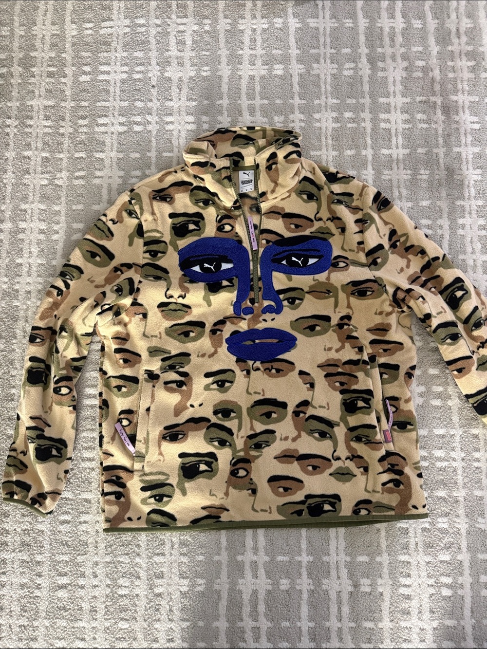 KidSuper x Puma Beige Camo Half-Zip Pullover with Bold Blue Face Graphic